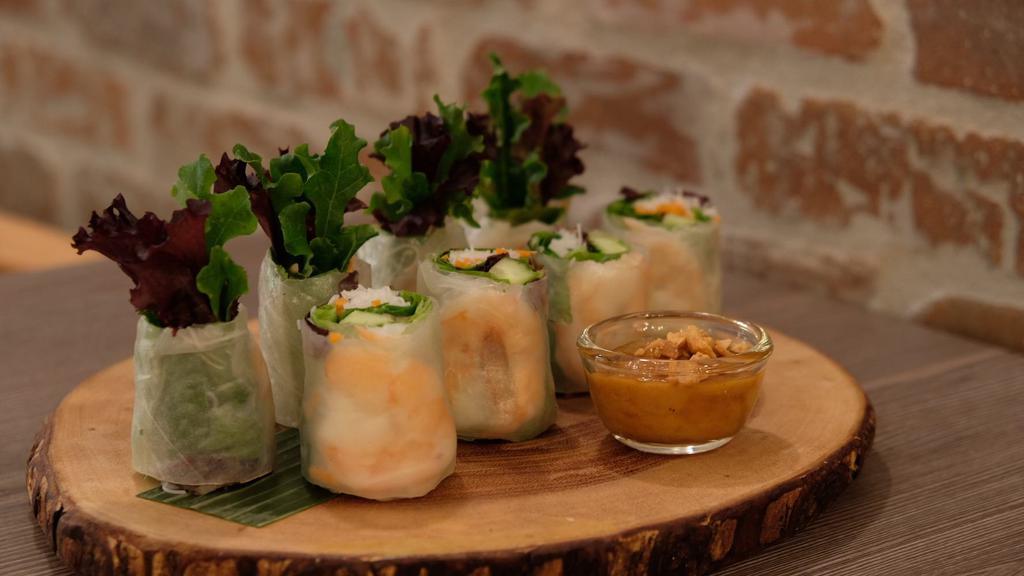 Fresh Rolls (Shrimp) · Prawn, lettuce, mixed green, mint leaves, cucumber, carrot, and vermicelli wrapped in rice paper served with peanut sauce.
