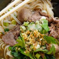 Thai Boat Noodle Soup  · Thin rice noodles, sliced beef, beef meatballs, Chinese broccoli, bean sprouts with crispy g...