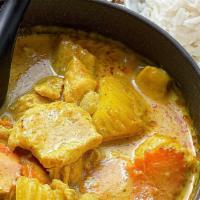 Yellow Curry  · Yellow coconut curry with potatoes, carrots, and onions. (Served with rice)