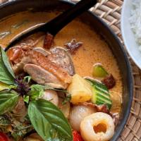 Roasted Duck Curry  · Roasted duck with red coconut curry, pineapple, lychee, tomato, zucchini, and basil. (Served...