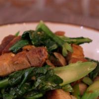 Kana Moo Krob · Stir-fried Chinese broccoli with crispy pork belly, garlic oyster sauce, and fresh chili.