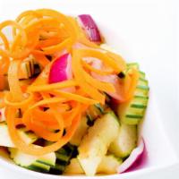 Cucumber Salad · Cucumber, red onion, carrot and sweet and sour sauce,