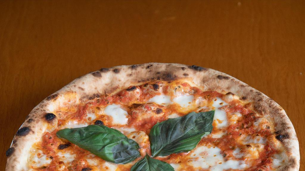 Margherita · Mozzarella cheese, tomato sauce and basil