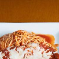 Veal Parmigiana · Breaded white veal loin, chees and marinara sauce with spaghetti