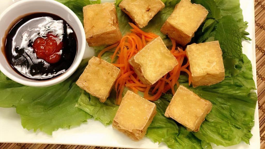 A7. Deep Fried Tofu / Đậu Hủ Chiên Dòn · Fried tofu served with soy ginger sauce.