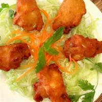 A8. Crispy Chicken Wings / Cánh Gà Chiên · Original or spicy sweet sour sauce.