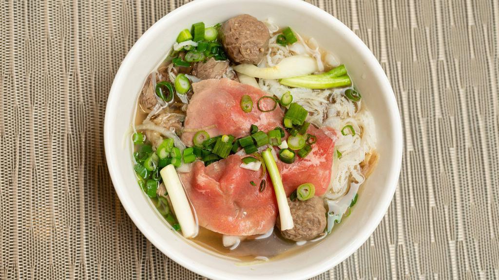 P19. Pho Combo Special  / Phở Đặc Biệt  · Beef noodle soup with steak, meatball, flank, well done brisket, tripe, tendon.
