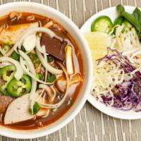 S35. Spicy Beef Noodle Soup / Bún Bò Hue · Spicy. Spicy lemongrass with slices of beef, pork and cube blood.
XLarge