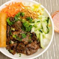 B80. Grilled Pork Vermicelli with Egg Roll / Bún Thịt Nướng Chã Giò · Vermicelli grilled pork and eggroll with lettuce cucumber, sprouts, carrots, with side of pe...