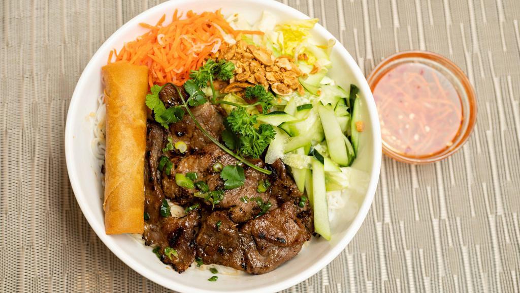 B80. Grilled Pork Vermicelli with Egg Roll / Bún Thịt Nướng Chã Giò · Vermicelli grilled pork and eggroll with lettuce cucumber, sprouts, carrots, with side of peanuts and fish sauce.