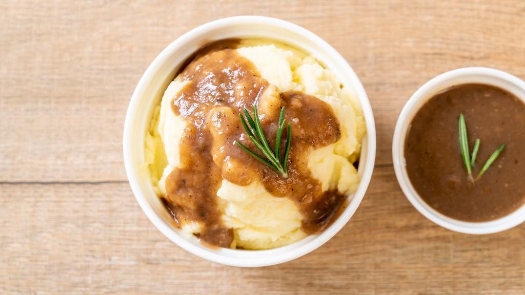 Mashed Potatoes & Gravy · Creamy potatoes with a serving of homemade gravy.