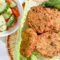 Falafel + Hummus Plate · Fresh hummus, 4 falafel patties, served with warm toasted pita bread, and a small cucumber &...