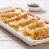 Fried Dumpling · Fresh steamed dumplings made with wheat flour, cabbage, onion, spices and garlic. customer's...