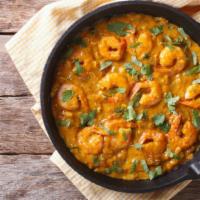 Prawn Curry · Prawn cooked with yellow onions, red and green bell peppers, cilantro, and chef's special sa...