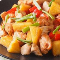 Pineapple Chicken · Diced pineapples into stir fry with fresh chicken, green onions, red and green peppers.
