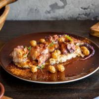 Pulpo · slow cooked octopus, piquillo peppers, pickled onions, garbanzo bean puree