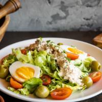 Ensalada Mixta · butter lettuce, cherry tomatoes, olives, egg, tuna salad
