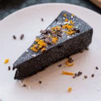Pastel de Chocolate · gluten free semi sweet chocolate cake, cocoa nibs, flor de sal