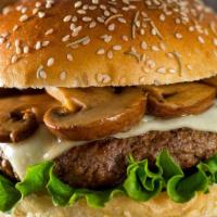 The Mushroom & Swiss Burger · Premium, 1/2 pound juicy, grilled beef burger (natural and sustainably raised from Niman Ran...
