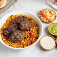 Rice Bowl with Beef Kebab · Turmeric spiced Basmati rice simmered with tomatoes, garlic, onions, mint, and parsley. Topp...
