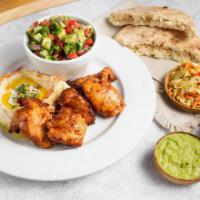 Chicken Skewer Plate · Grilled all natural chicken thigh with secret spices. Served with 1 pita and choice of two s...