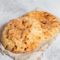 Pita · Freshly baked pita bread. Vegan. Contains gluten. We cannot make substitutions.