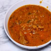 L01. Lamb Curry · Lamb cooked with onion and tomato based sauce flavored with a variety of herbs & spices.