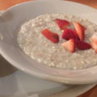 Irish Oatmeal · Served with fresh fruit, milk, and brown sugar.