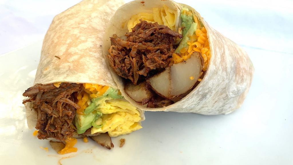 Pulled Pork Breakfast Burrito · Carnitas. A massive unit of 2 scrambled eggs, braised pulled pork, melty cheddar, home fries, avocado and onion marmalade.