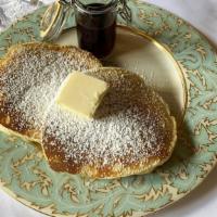 Plain Pancakes · 2 large buttermilk pancakes served with butter and syrup.