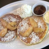Caramelized Apple Pancakes · Two large, caramelized Granny Smith apple buttermilk pancakes, served with syrup and butter....