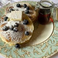 Blueberry Pancakes · Two large blueberry buttermilk pancakes, with syrup and butter. PANCAKE ADD ONS