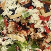 Mexican Caesar Salad · Crispy Romaine lettuce tossed in our own cilantro-pepita dressing & topped with charbroiled ...
