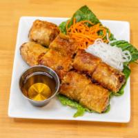 Imperial Rolls · Deep fried rolls stuffed with ground pork, carrots, taro, mushroom and clear noodles. Served...