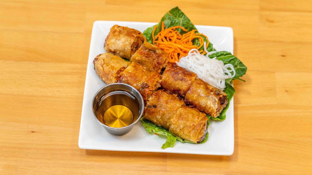 Imperial Rolls · Deep fried rolls stuffed with ground pork, carrots, taro and clear noodles. Served with fish sauce, lettuce and pickles.