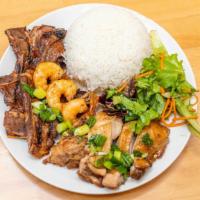 Combination Rice Plate · Pork Chop, chicken and grill shrimp.