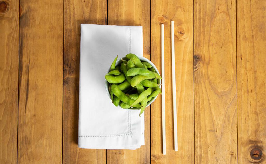 Edamame · Light salted boiled green soy beans.