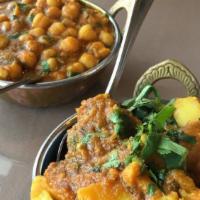 Malai Kofta · Vegetarian. Three mixed vegetable balls in saffron curry.