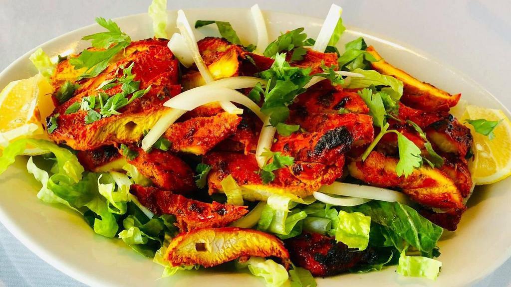 Fish Tandoori · Fish marinated and cooked in a clay oven.
