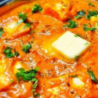 Paneer Makhni · Cottage cheese cooked with cream, fresh tomato sauce, spices, and herbs.