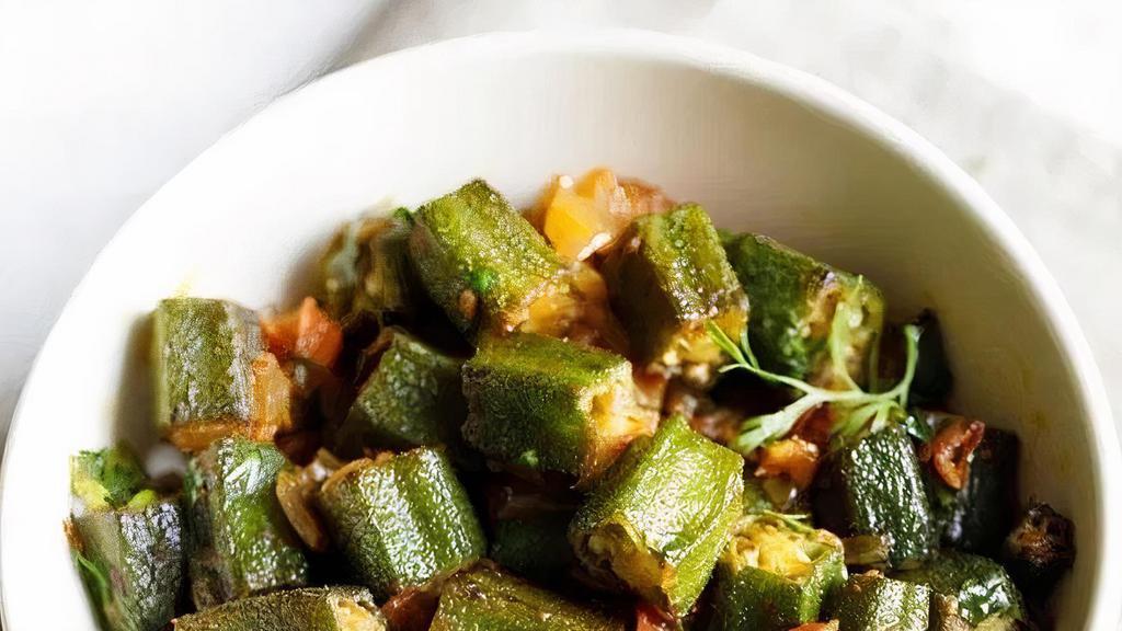 Bhindi Masala · Fresh okra sauteed with onions, tomatoes, and fine spices. May contain ginger garlic paste.