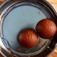 Gulab Jamun · Two pcs of hot Indian dessert consisting of fried balls of a dough made from milk solids, so...