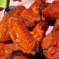 Original Wings · Your choice of sauce or dry rub. Served with celery, carrot sticks, and choice of Ranch or B...