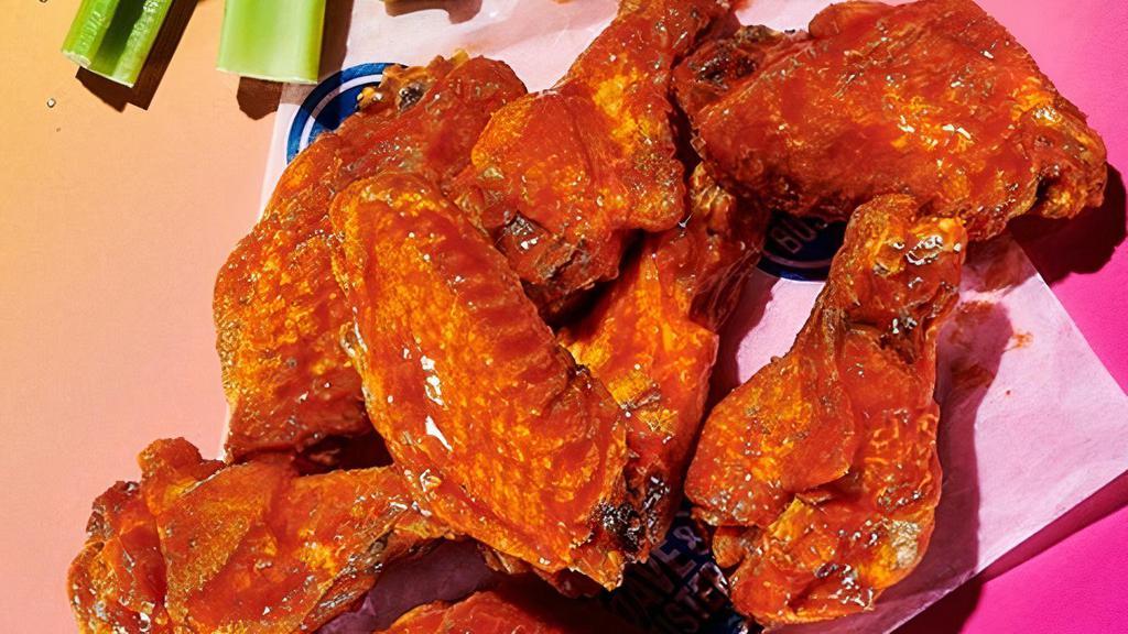 Original Wings · Your choice of sauce or dry rub. Served with celery, carrot sticks, and choice of Ranch or Bleu Cheese