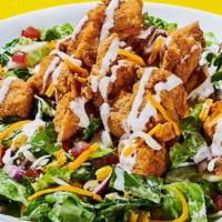 Crispy Chicken Cobb Salad · Crispy tenders, romaine, spring mix, red onions, cucumbers, pico de gallo, buttermilk ranch,...