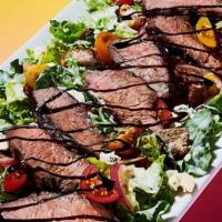 Steak Salad · Spring mix, grape tomatoes, Danish Bleu cheese crumbles, candied pecans, croutons, white bal...