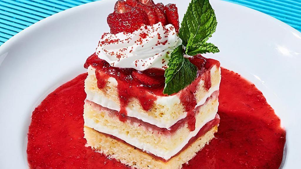 Strawberry Shortcake · Whipped cream, strawberry puree, strawberries, fresh mint.