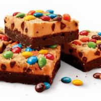 Kooky Dough Brownie Made With M&M’S® Minis · Brownie topped with cookie dough frosting and M&M’S® Mini Chocolate. 4-piece order. (825 Cal...