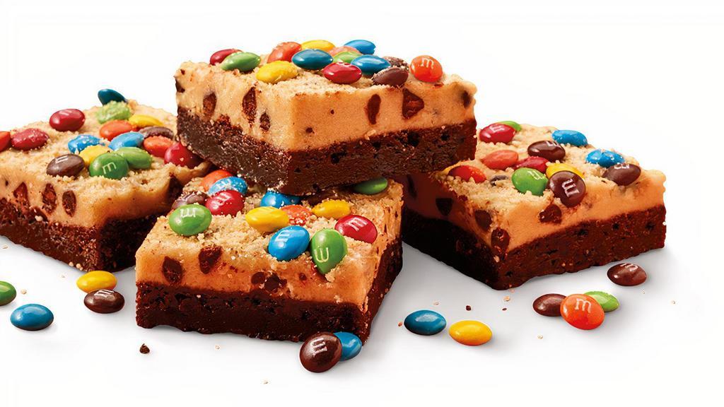 Kooky Dough Brownie Made With M&M’S® Minis · Brownie topped with cookie dough frosting and M&M’S® Mini Chocolate. 4-piece order. (825 Cal per order)