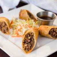 Beef Springs Rolls · Dry aged beef, cabbage, carrot, celery, cilantro and ginger plum sauce.